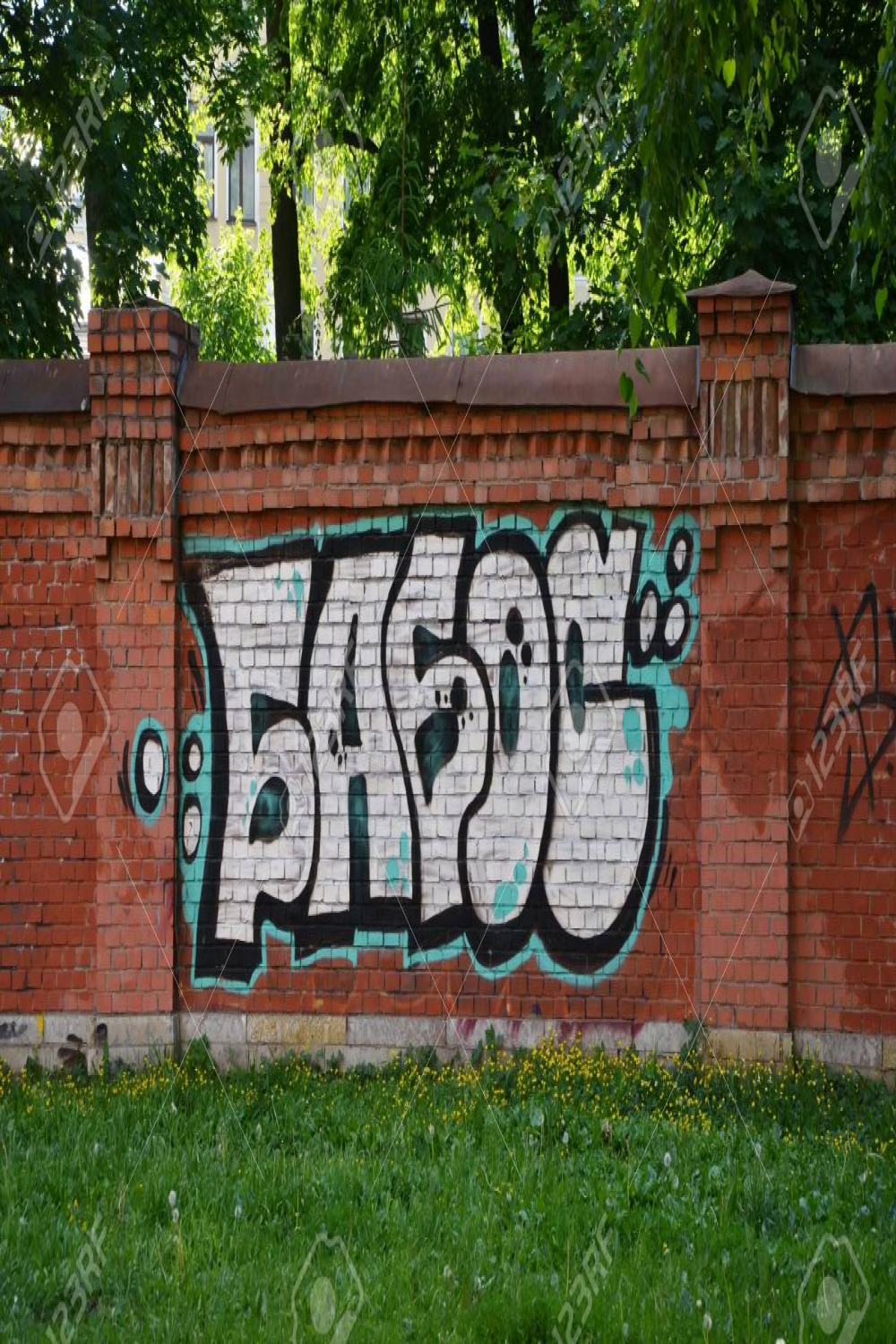 Graffiti Tagging On A Brick Wall In SaintPetersburg Russia Stock