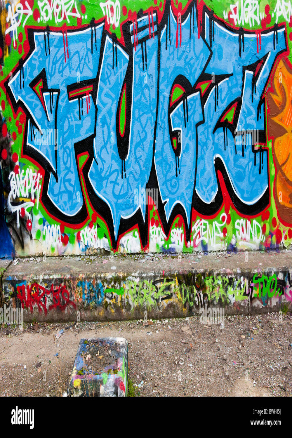 graffiti word painted on wall Stock Photo - Alamy