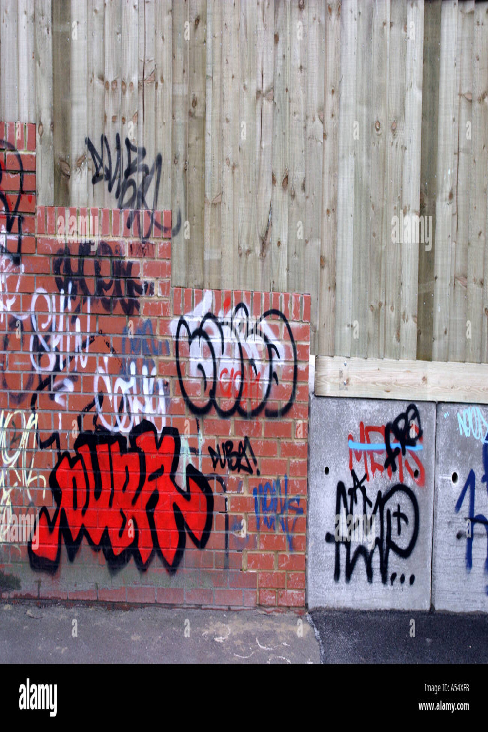 Random graffiti and tags on brick wall in Swindon Wiltshire Stock