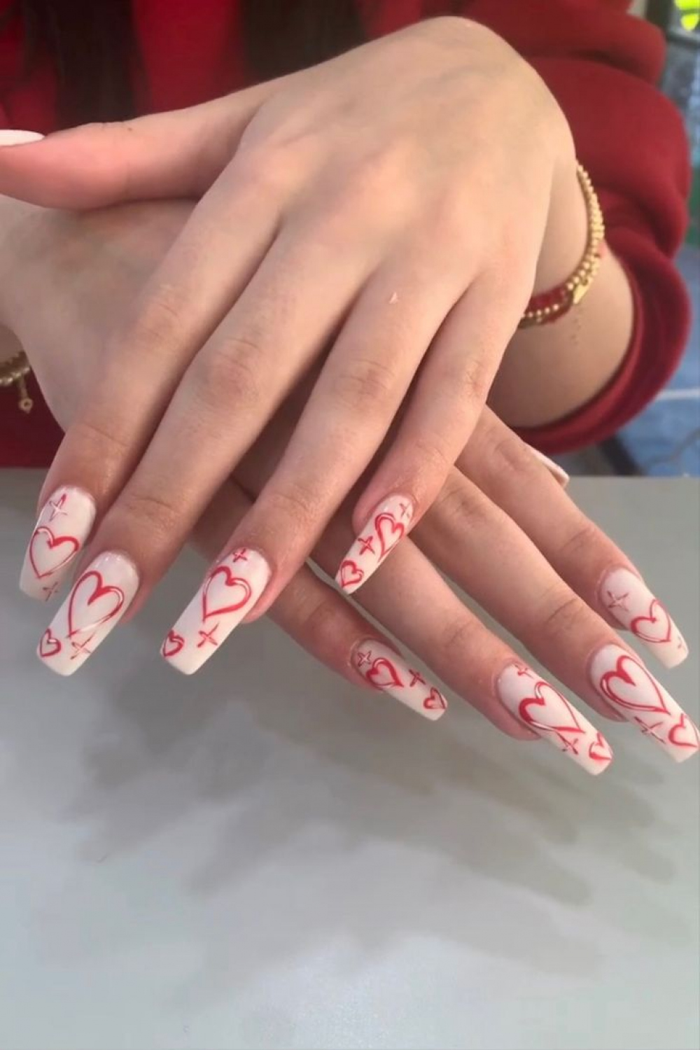 Red graffiti heart nails in   Valentine