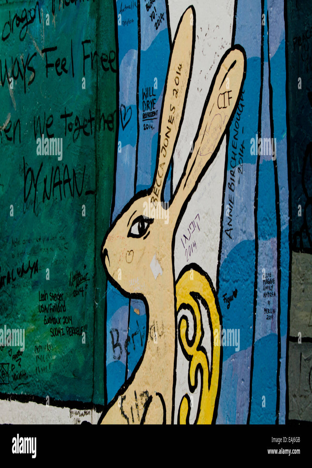 Graffiti cartoon rabbit Berlin wall tags art urban Stock Photo - Alamy