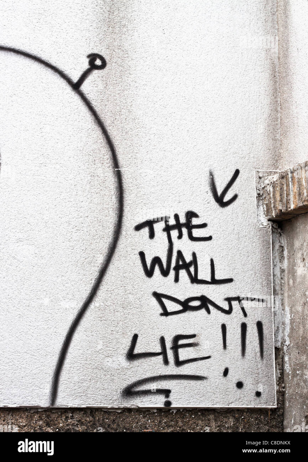 Graffiti writing The Wall Dont Lie Stock Photo - Alamy