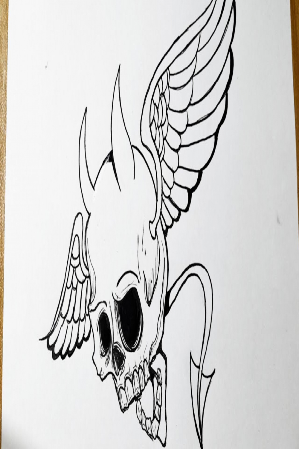 How to draw a skull with wings  Tribal skull drawing