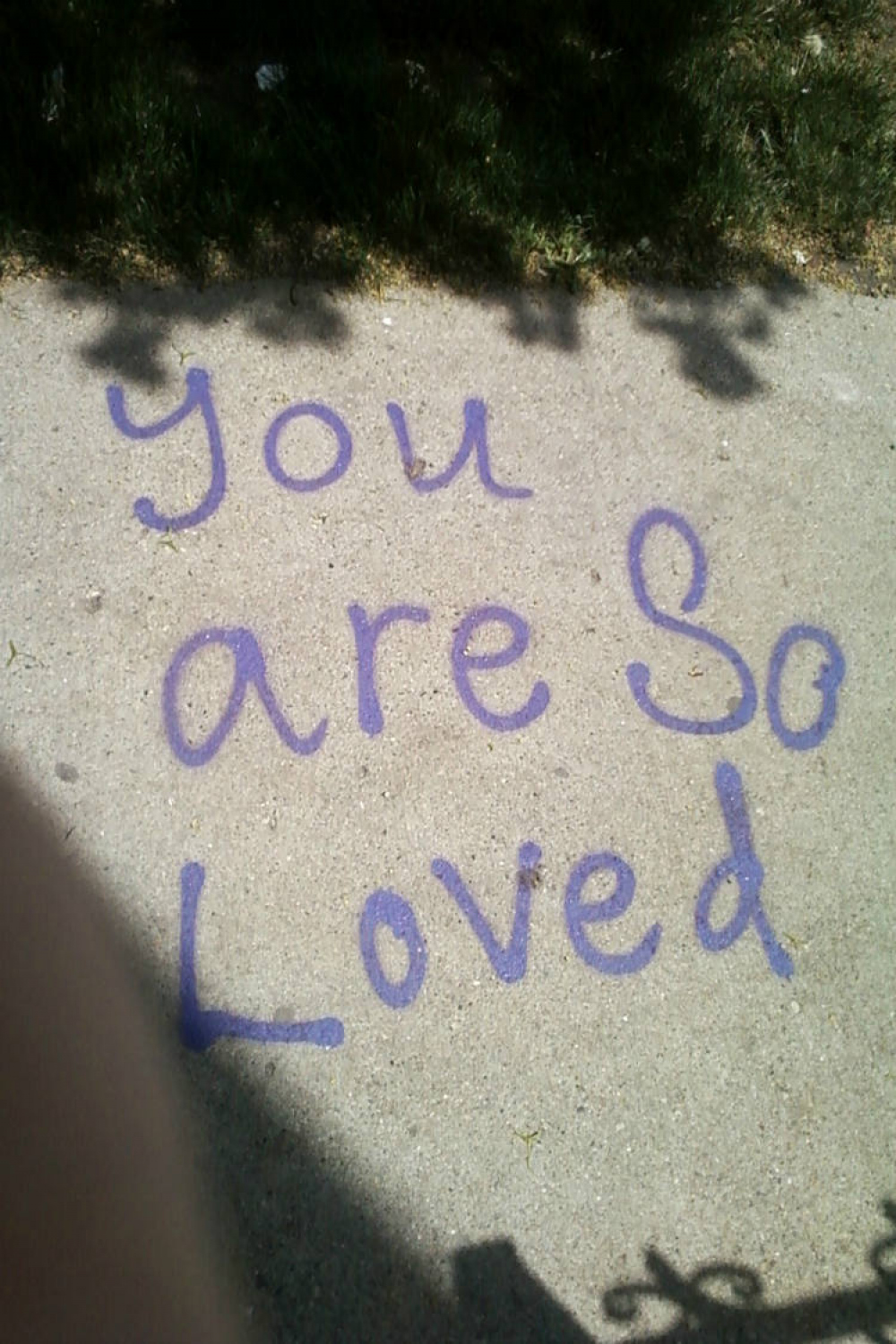 love photo, self-love art, love photography, graffiti quote, sidewalk  writing, tagging, cement, purple and gray, shadows, wall art, teens