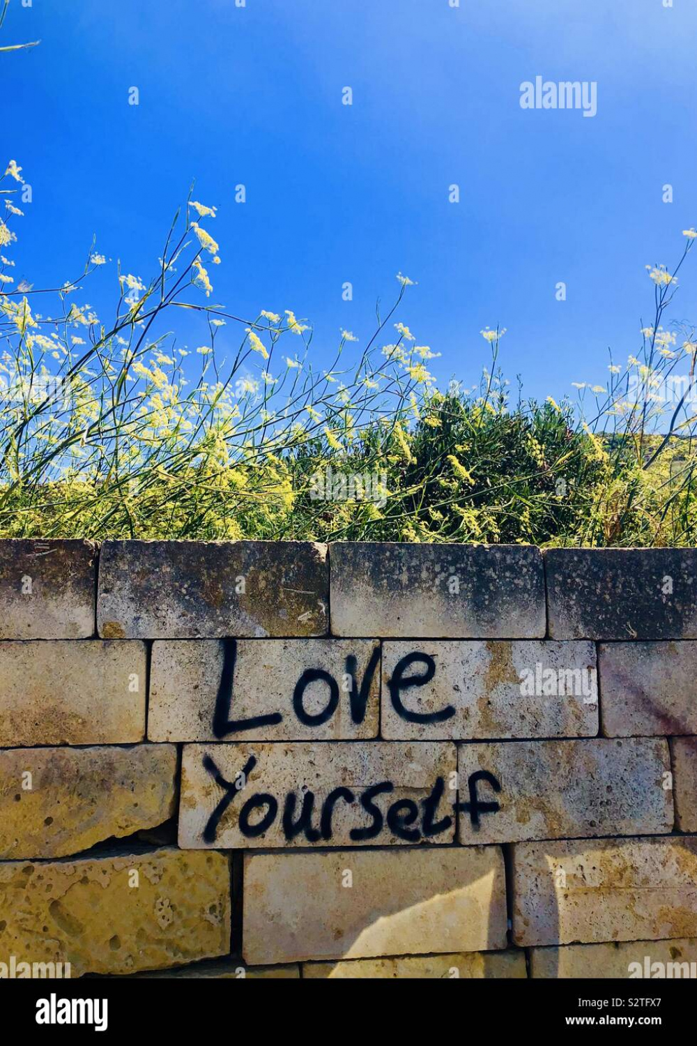 Love yourself graffiti hi-res stock photography and images - Alamy