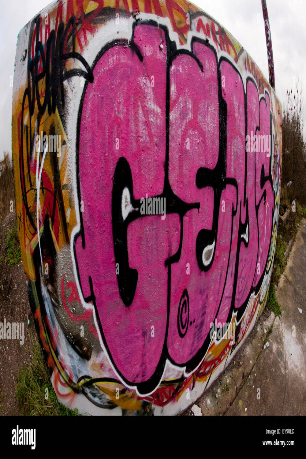 Wall with colourful graffiti hi-res stock photography and images